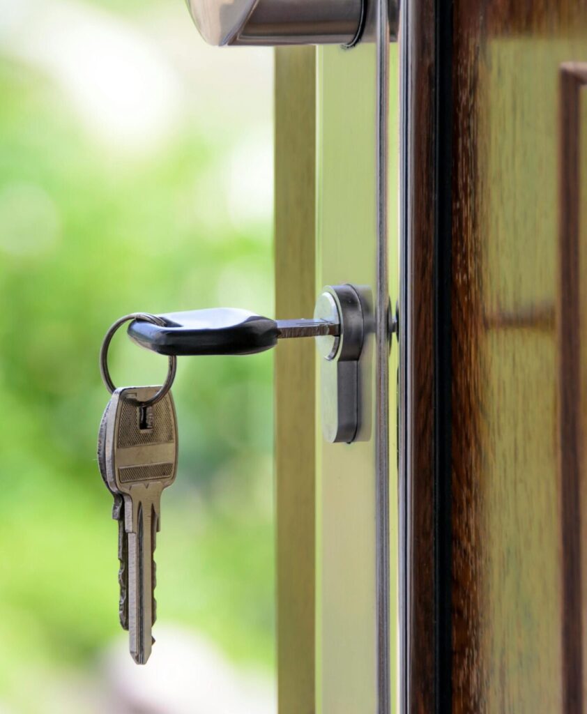 Image of a key in a door